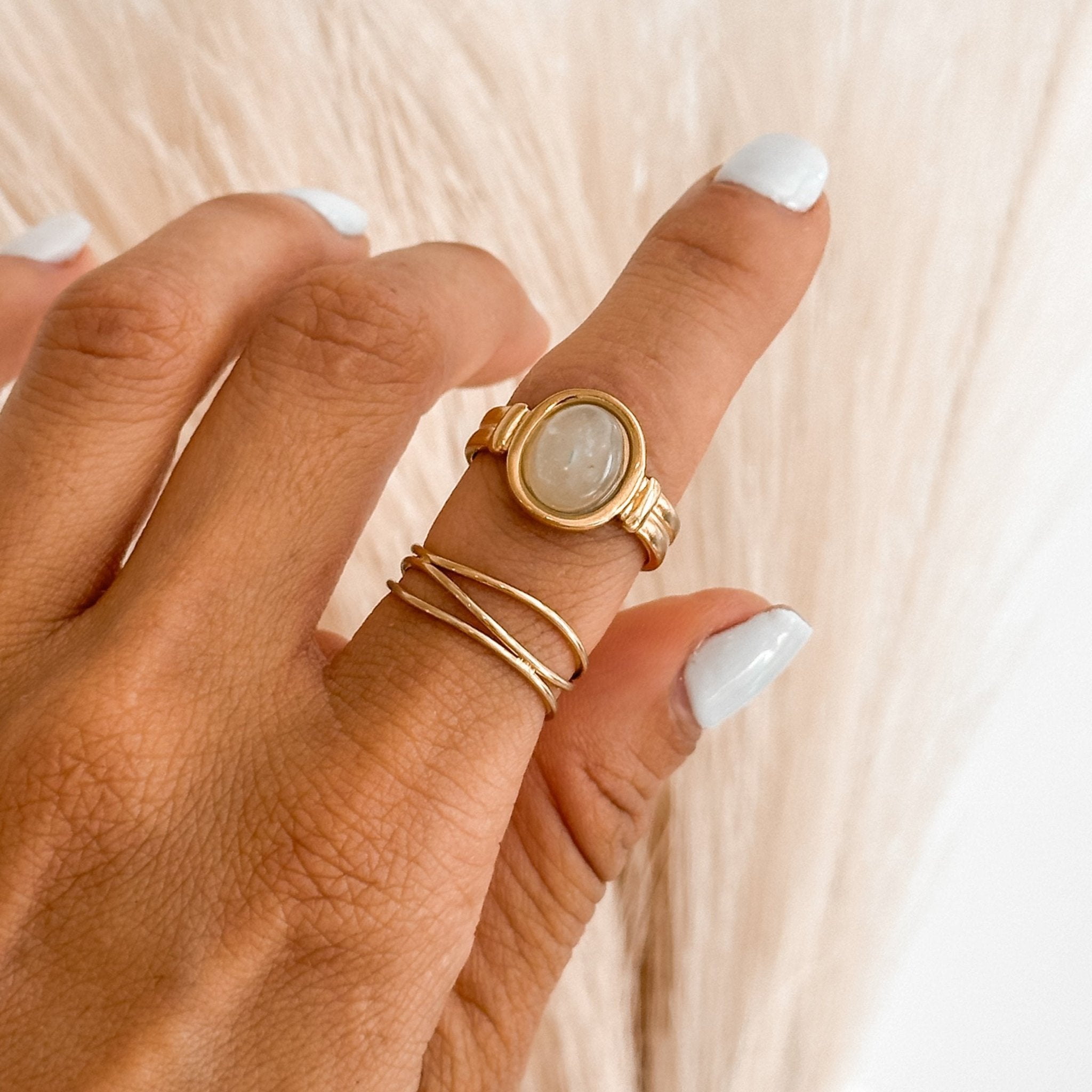 Green ring combined with another stacking ring for boho look