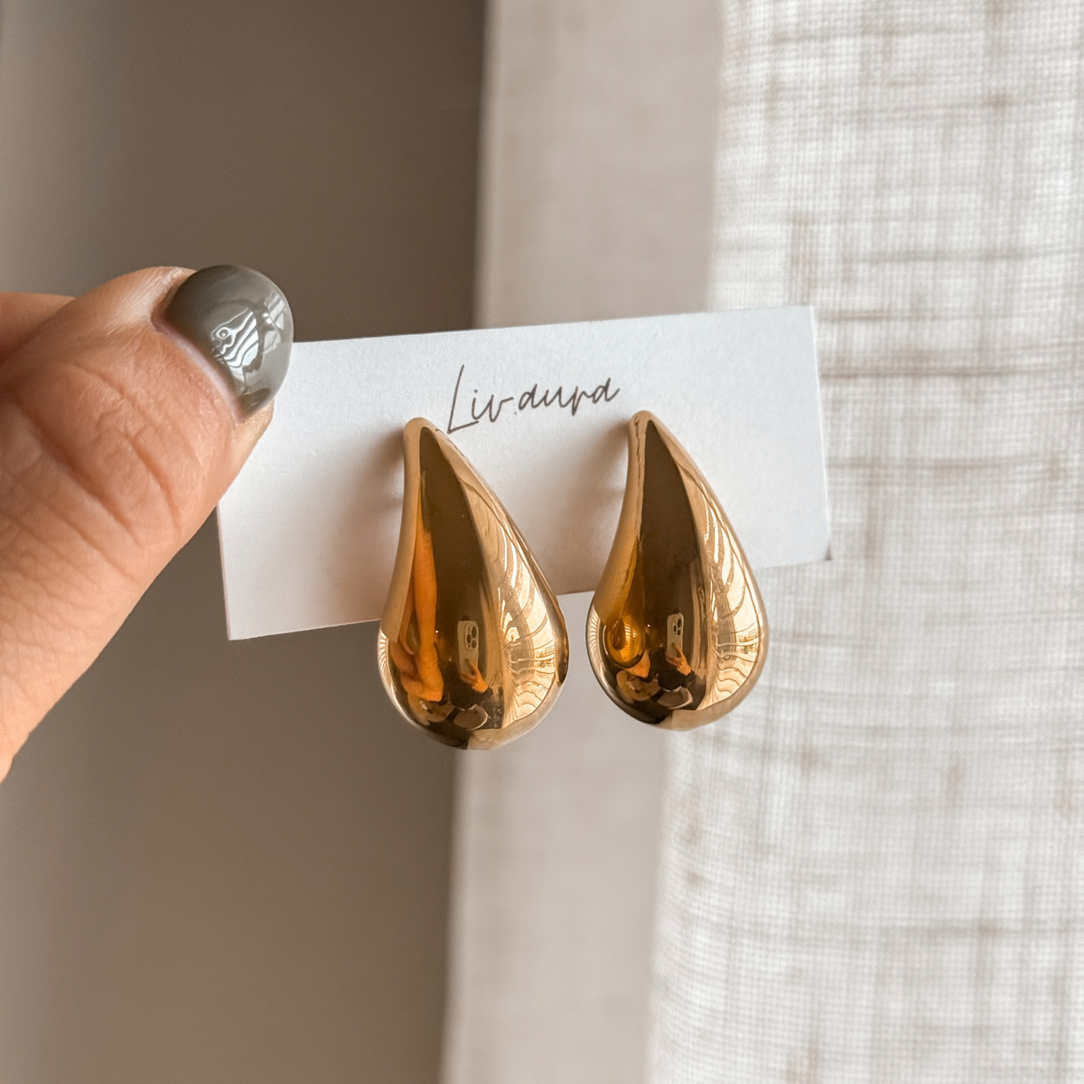 Gold teardrop earrings on a Liv Aura earring card – Liv Aura