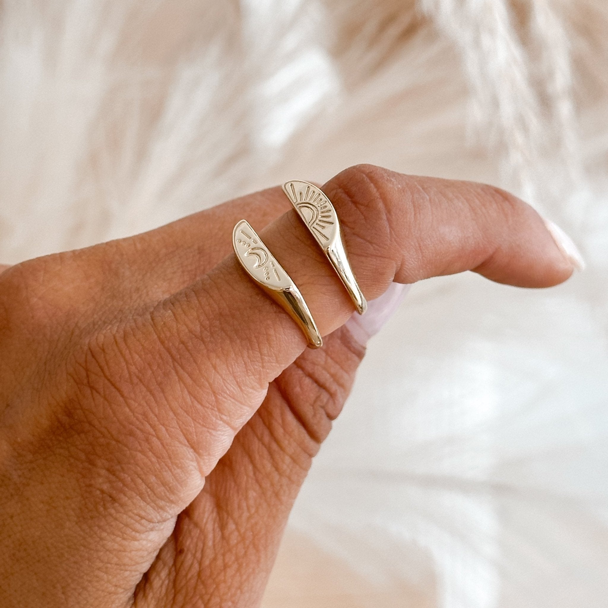 Stacked Moon & Sun Rings – celestial-inspired, 18K gold-plated, perfect for everyday wear.