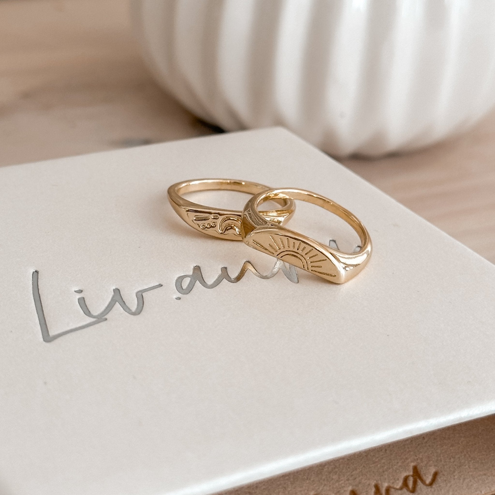 Moon & Sun Ring Set displayed on elegant gift packaging – symbolic, waterproof & hypoallergenic jewelry.