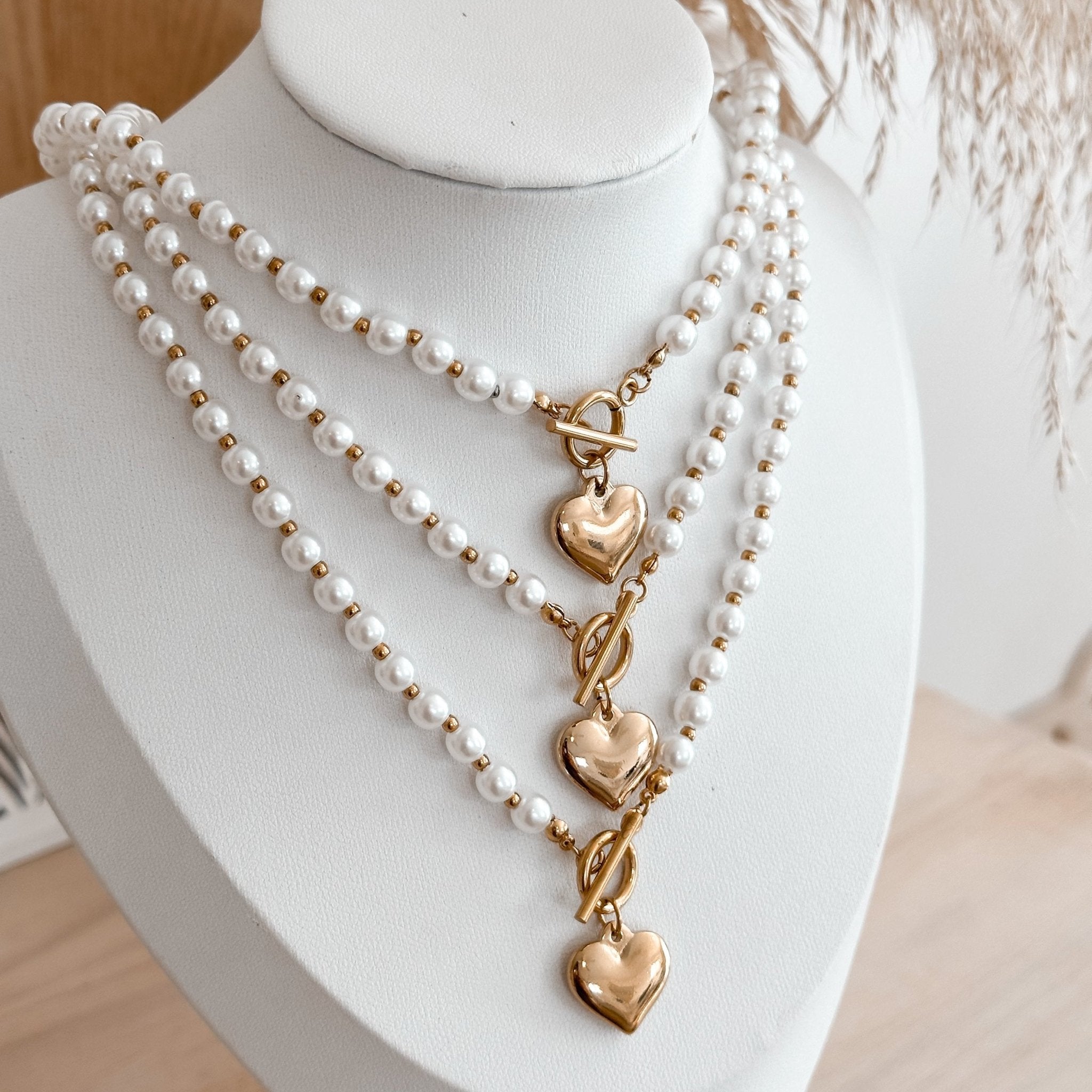 Layered look of toggle heart pendant necklaces with white beads – 18K gold plated statement necklaces for gifting or stacking