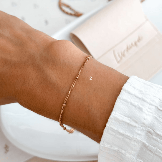 Delicate beaded gold bracelet, hypoallergenic and waterproof.