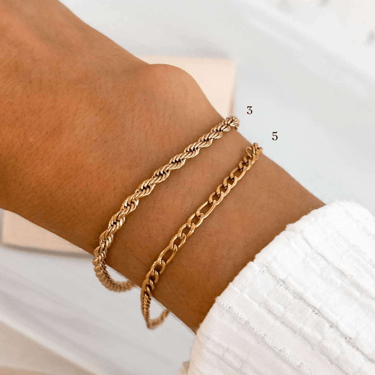 Twisted rope-style bracelet in 18K gold plating.

