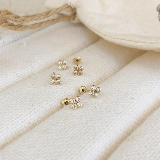 minimalistic studs, these gold-plated mini clover earrings are both dainty and elegant