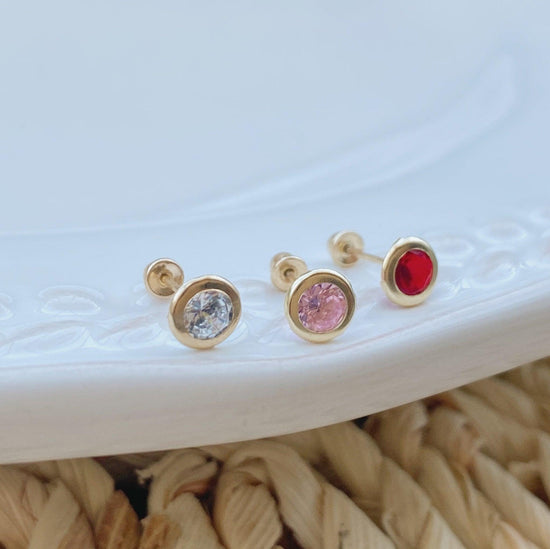 gold bezel stud earrings They are small enough to be subtle yet make a statement, for elegance and style.