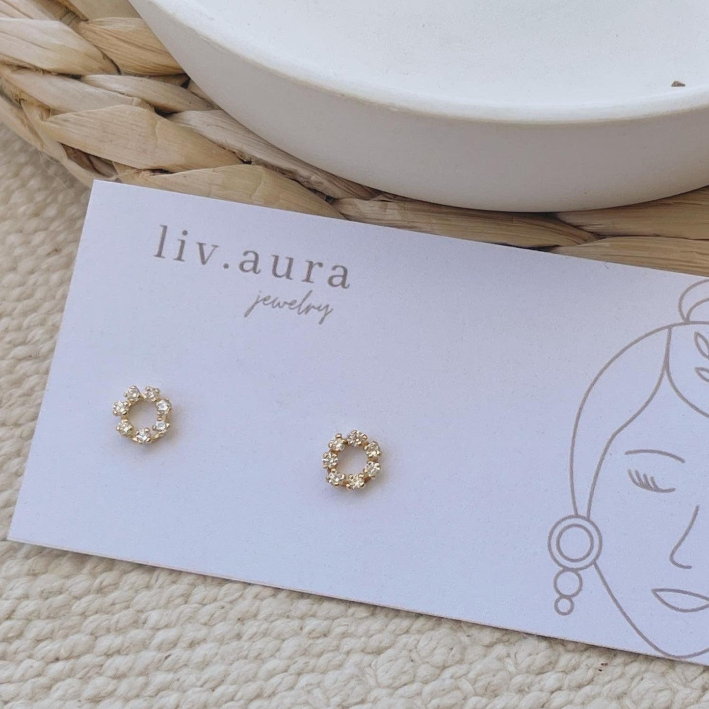 If you're looking for a simplistic and classy look, you'll love these open circle stud earrings. These gold circle earrings are the perfect pair for any outfit and make a great gift for your friends and family. Wear them with your hair up in a bun to highlight their design, or wear them hanging from your lobes!