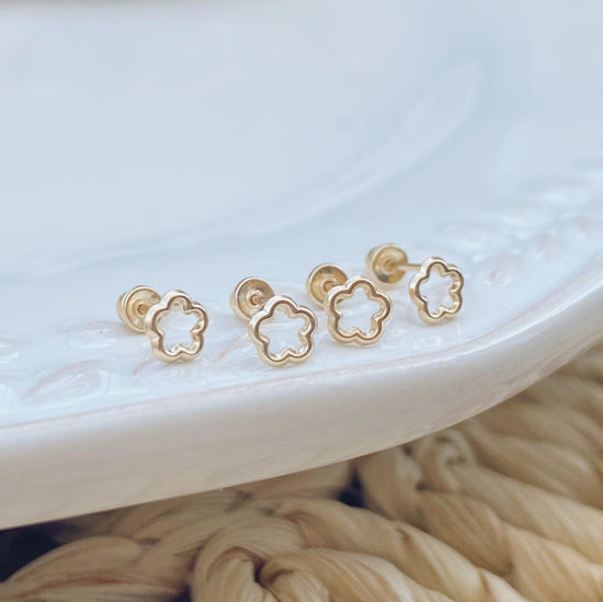 Load image into Gallery viewer, Gold Earrings are perfect for any earrings collection. The flower studs are a beautiful addition to any outfit, making it super easy to get the complete look. 
