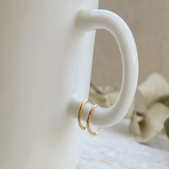 Huggie Hoop Earrings are the perfect huggie hoops that are made to look great and comfortable while you wear them. Hoops like these will make your ears look dainty and cute, yet classy and elegant all at once!