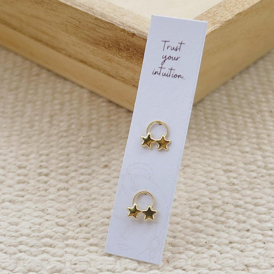 Load image into Gallery viewer, These beautiful gold star stud earrings feature an open circle with a small gold star inside. A great gift for mothers day, these gold earrings are sure to impress anyone who sees them
