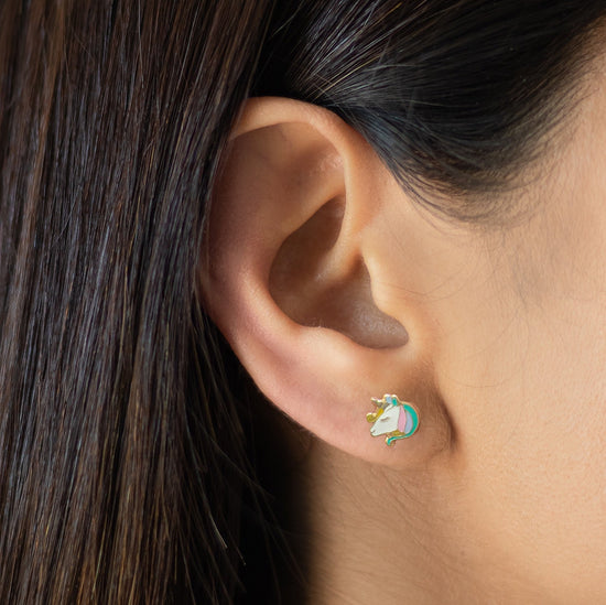 Load image into Gallery viewer, Featuring the Unicorn and Magical designs, these little earrings are perfect for your little girl. These fun Unicorn Earrings have been crafted in 10k gold and set with enamel. en
