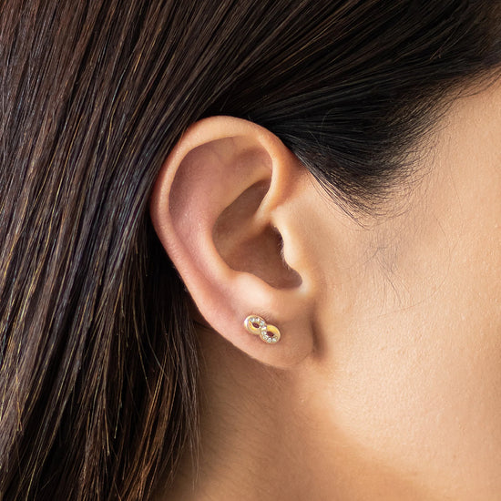 Load image into Gallery viewer, Our gold infinity symbol stud earrings are perfect for girls, brides and bridesmaids. 
