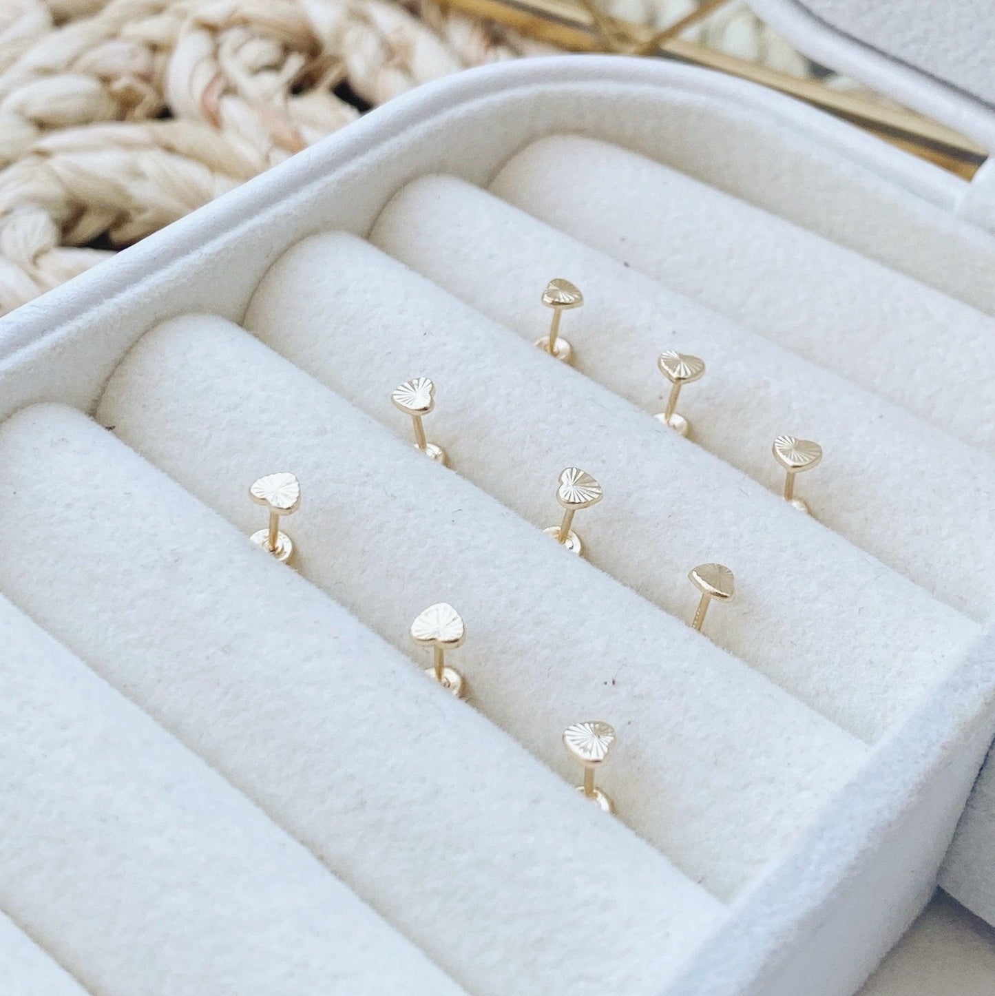 Our dainty tiny heart earrings are perfect for everyday wear and make the perfect gift! The second hole screw back earring is a great way to dress up any look, be it casual or dressy. 