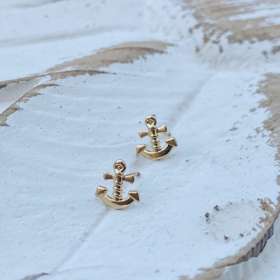 Load image into Gallery viewer, 10k solid gold anchor earrings,A classic piece of jewelry that is sure to become a staple in your wardrobe. These stud earrings are made of solid 10K gold, making them very durable and long lasting.
