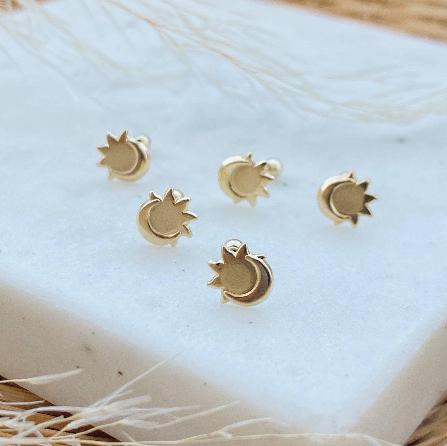 Load image into Gallery viewer, Add a touch of celestial magic to your look with this pair of elegant earrings. The solar eclipse is the perfect symbol of balance, wholeness and renewal. These earring are also made in a very unique design and style to show your love for yoga and meditation.
