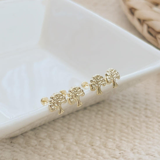 Load image into Gallery viewer, A touch of elegance to your look with these Gold Tree of Life Stud Earrings. These studs are perfect for anyone looking for a simple, yet beautiful look.
