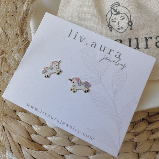 Our 10K Gold Unicorn Stud Earrings are perfect for any occasion. These gold enamel stud earrings are great for all ages.
