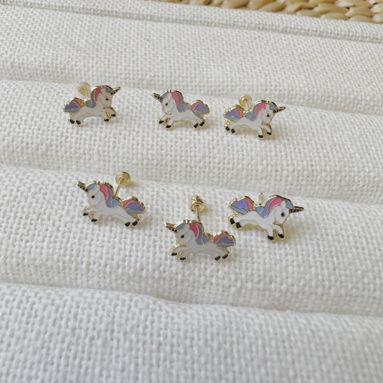 Load image into Gallery viewer, These unicorn stud earrings are handcrafted with genuine 10K gold and enamel. It is lightweight and very comfortable to wear! These earrings are perfect for everyday use, but also make a great gift.

