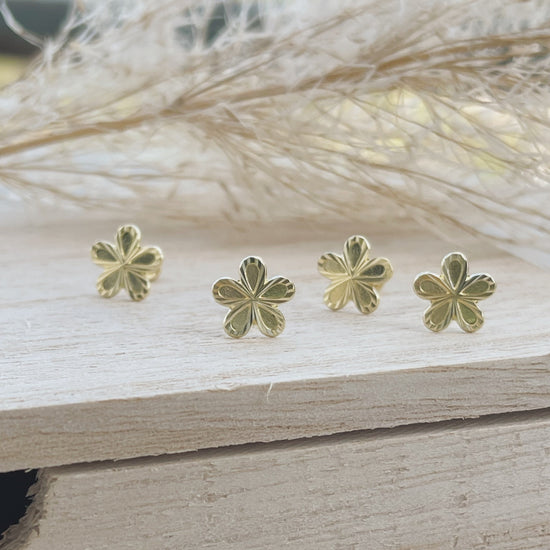 Load image into Gallery viewer, This tiny flower earring is perfect for your little girl or someone in need of a dainty and subtle everyday look. Perfect for bridal parties, these gold set studs are the perfect flower girl gift!
