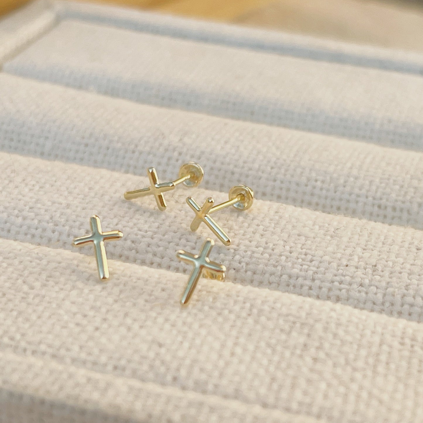These small, but bold earrings are a great way to express your faith. The solid 10k gold cross studs are optimized for comfort and durability. The simple design is perfect for anyone who likes to keep it simple or those new to wearing religious jewelry.